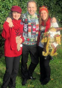 Our Carollers in trio format in our Christmas jumpers